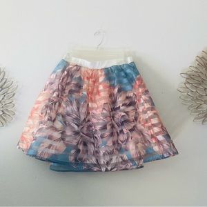 Rue21 skirt. Size: Large. Colors: Black, Teal, shades of pinkish orange.
